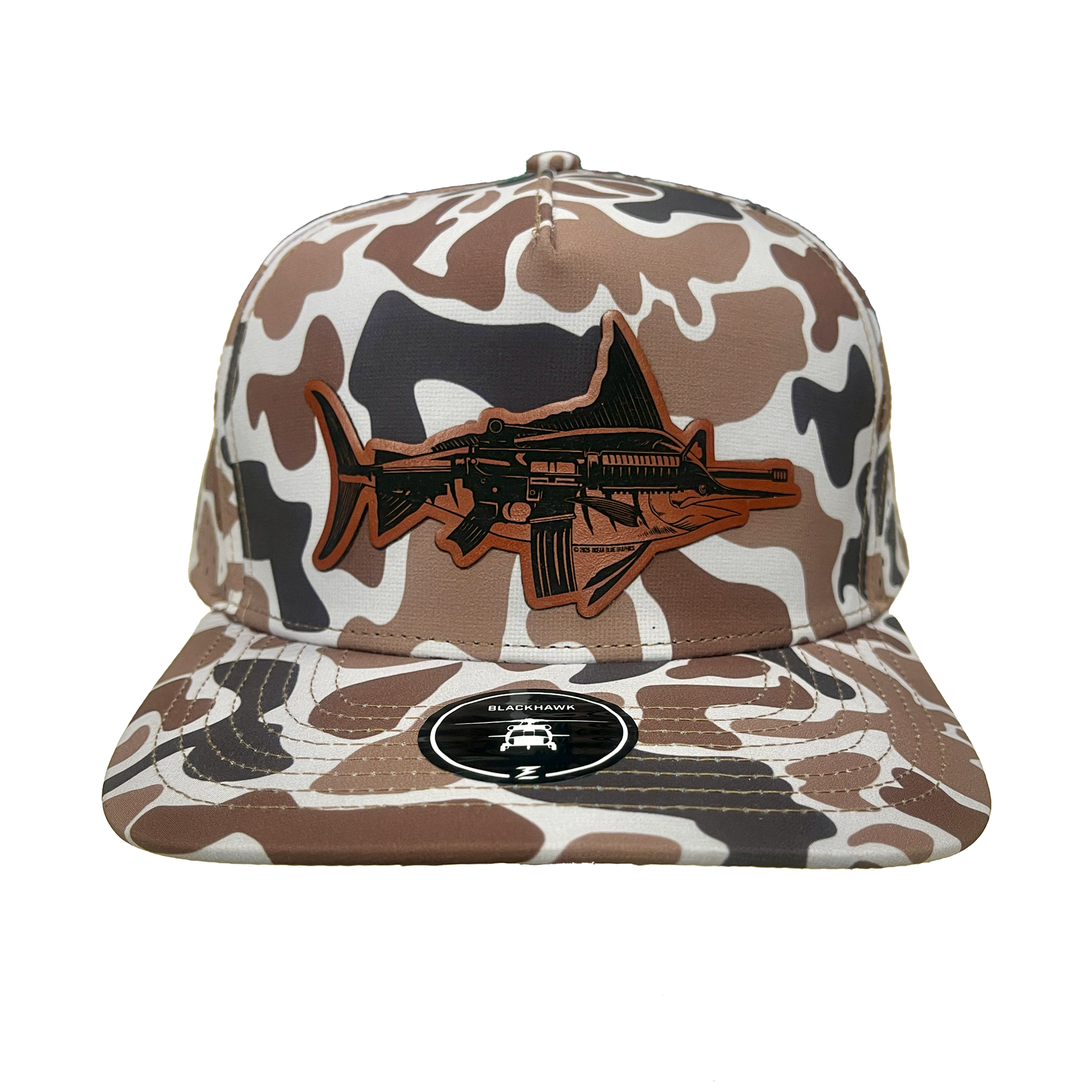 Front view of the mARlin Hat in Blackhawk Light Old-School Camo, showcasing a brown laser-cut leather patch design.​

